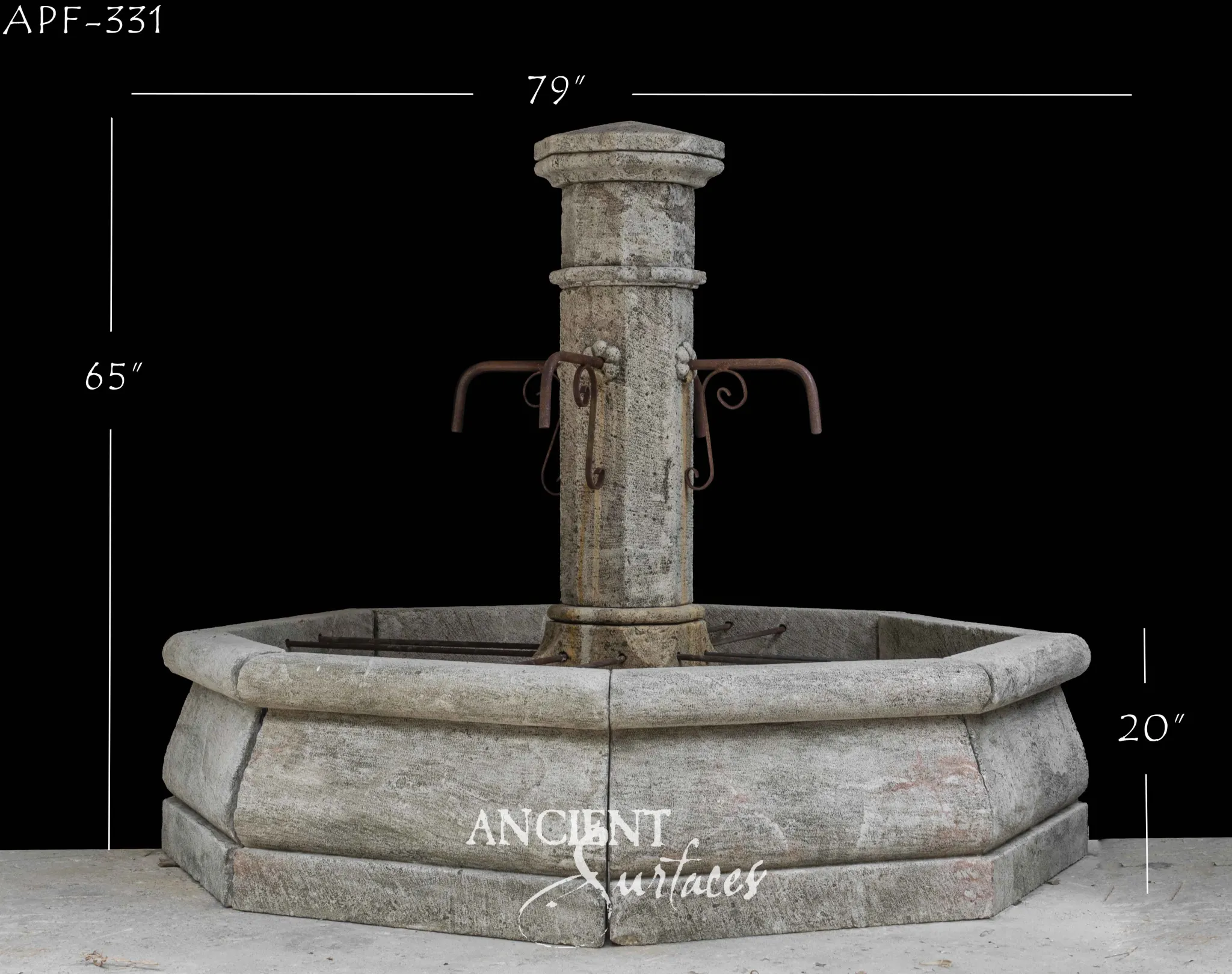 Weathered reclaimed limestone pool fountain with a round shouldered pillar, twin scrolled iron spout arms and an octagonal pool washed with rust pink colour