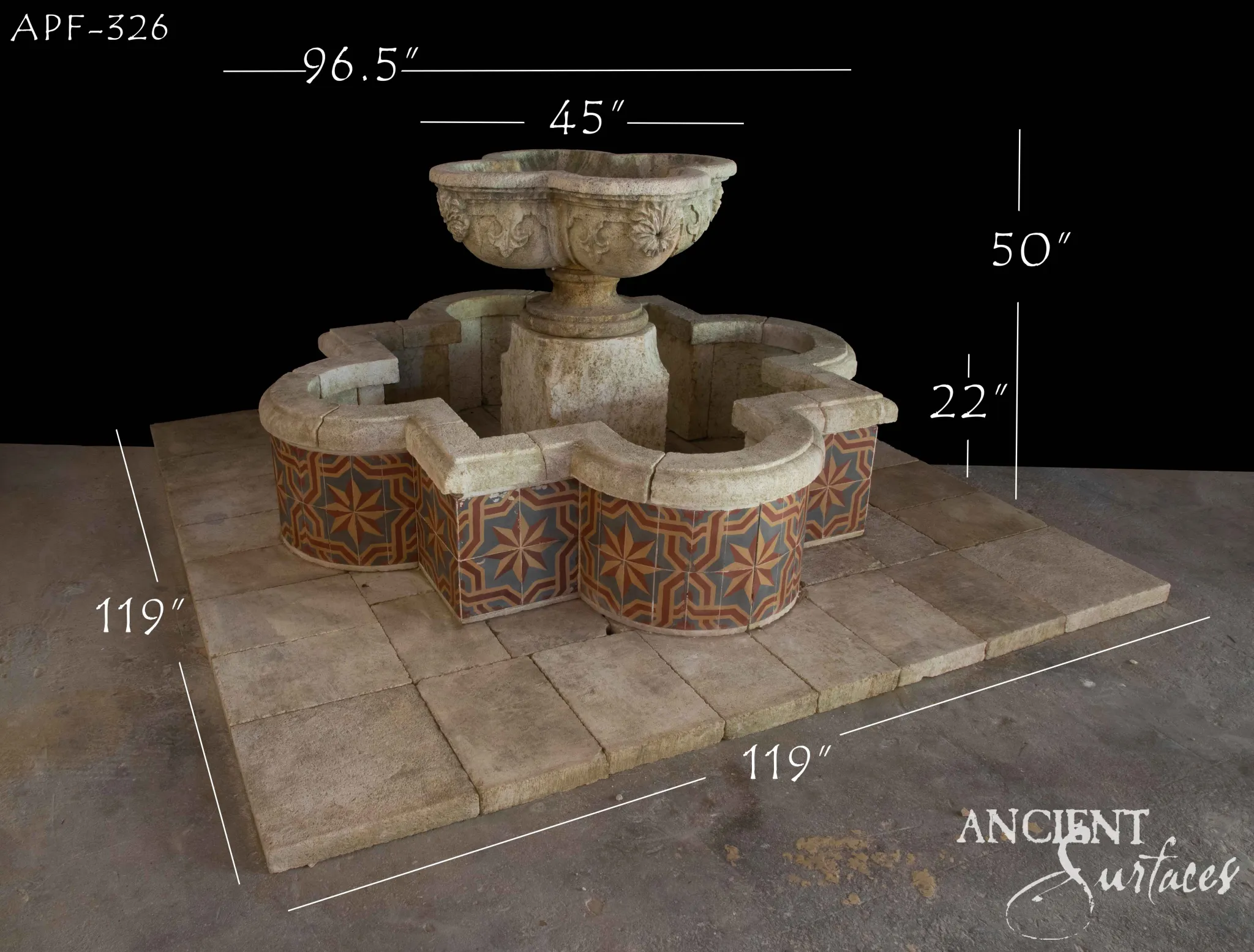 Ancient Surfaces reclaimed limestone pool fountain with a carved urn bowl above a quatrefoil pool faced in orange and blue star patterned tile